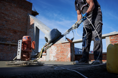 A man working on a concrete restoration project.