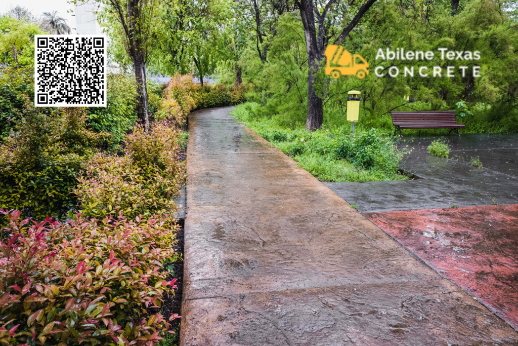 A home sidewalk with a beautiful imprinted concrete design.